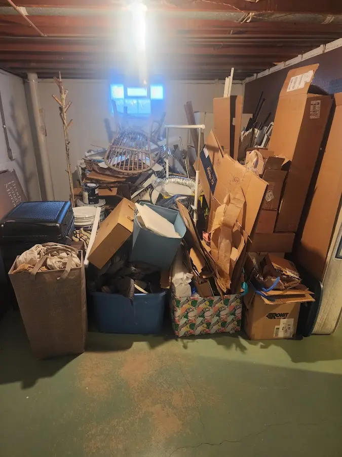 Roll-off dumpster container at job site for 20 Yard Dumpster Rental in Creve Coeur